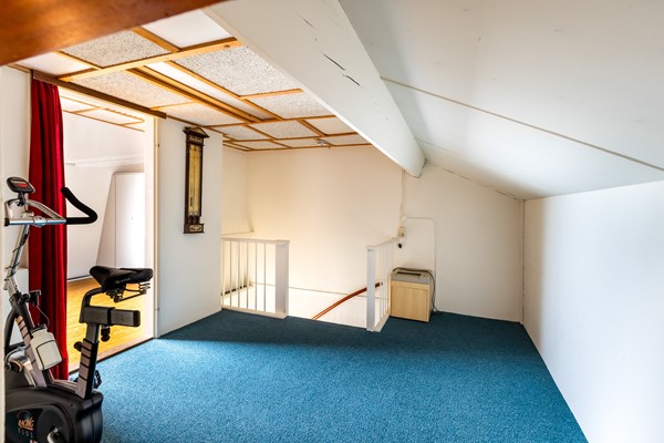 Foto - Te koop: tussenwoning gelegen aan groenvoorziening